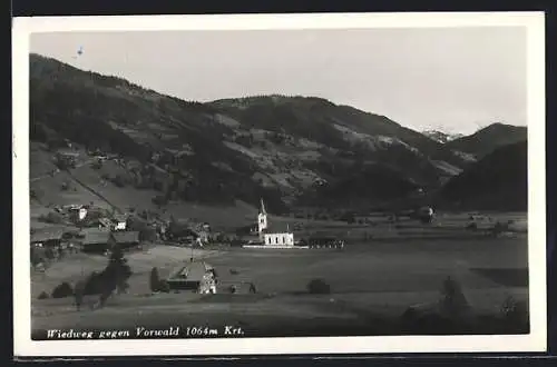 AK Reichenau /Kärnten, Wiedweg, Ortspartie mit Kirche gegen Vorwald