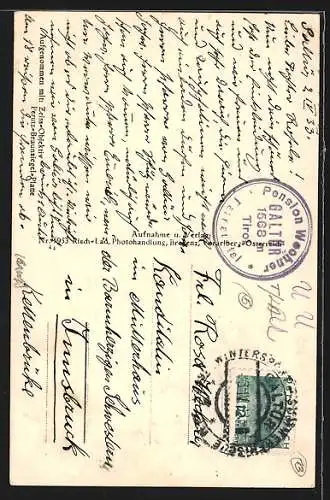 AK Galtür, Ortsansicht mit Kirche zur Winterzeit