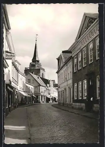 Foto-AK Aurich /Ostfr., Partie in der Burgstrasse, mit Schreibwaren Biermann u. Kirche