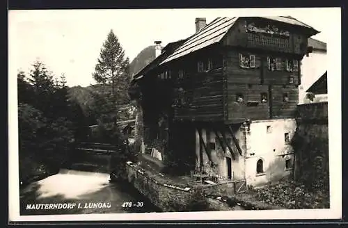 AK Mauterndorf /Lungau, Altes Haus am Fluss