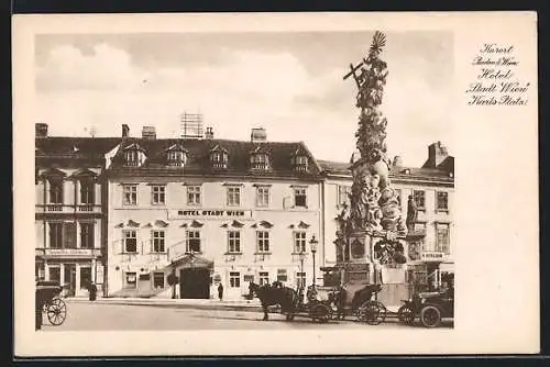 AK Baden b. Wien, Hotel Stadt Wien am Karlsplatz mit Denkmal