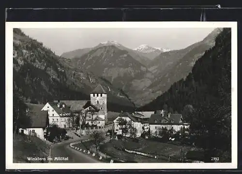 AK Winklern im Mölltal, Strassenpartie mit Gasthaus und Kaufhaus