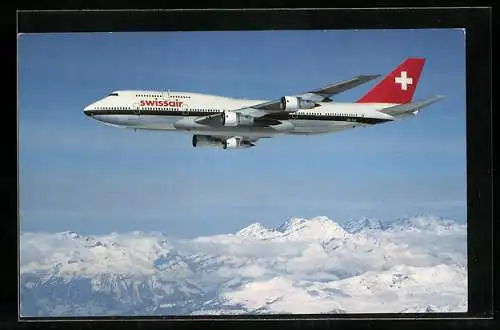AK Passagierflugzeug des Types Boeing 747-357 über den Wolken