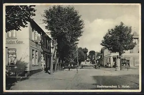 AK Hademarschen i. Holst., Strassenpartie mit Cafe Egge und Geschäft