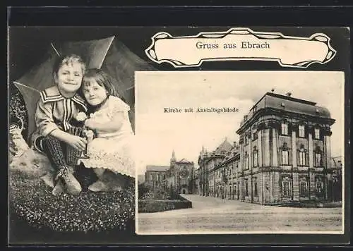 AK Ebrach, Kirche mit Anstaltsgebäude, zwei Kinder mit Regenschirm