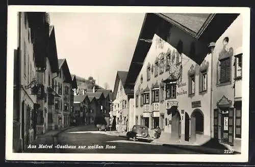 AK Matrei, Strassenansicht mit Gasthaus zur weissen Rose