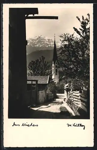 AK Mieders, Der Kirchturm gegen die Berge