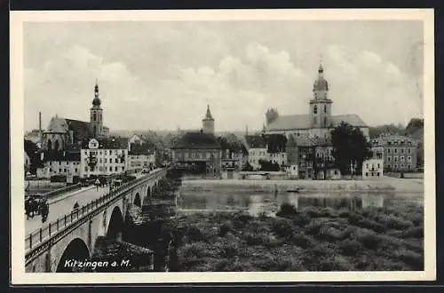 AK Kitzingen am Main, Partie neben der Brücke, Blick zur Kirche im Ort