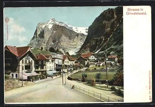 AK Grindelwald, Strassenpartie mit Hotel Kreuz und Bergen