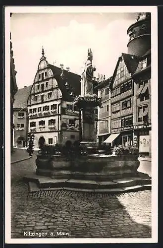 AK Kitzingen a. Main, Strassenpartie mit Kaiser`s Kaffeegeschäft und Brunnen