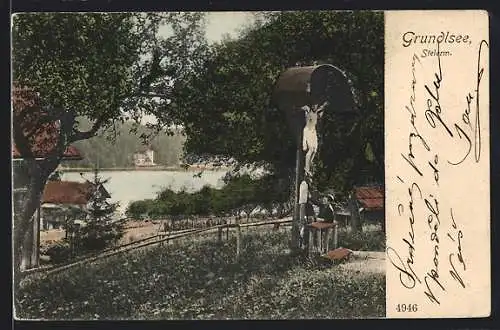 AK Grundlsee, Junger Mann am Flurkreuz