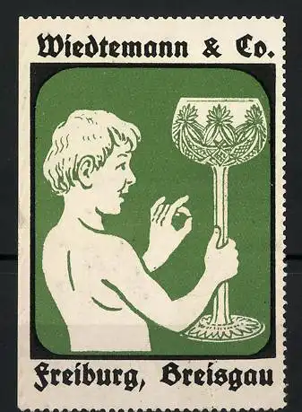 Reklamemarke Freiburg, Wiedtemann & Co., Bube mit Kristallglas