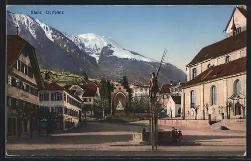 AK Stans, Brunnen, Denkmal und Kirche am Dorfplatz