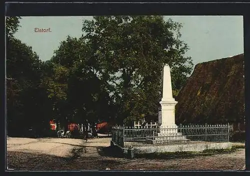 AK Elstorf, Denkmal an strohgedecktem Haus