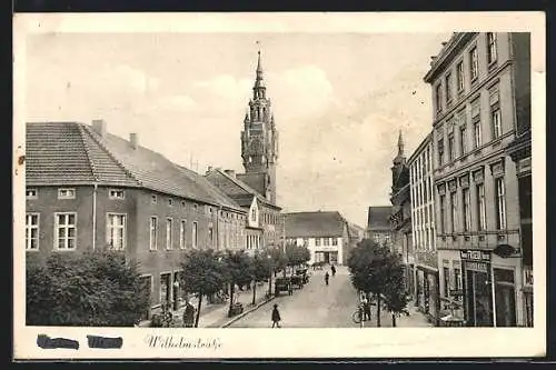 AK Dahme /Mark, Die Wilhelmstrasse mit Blick auf den Kirchturm
