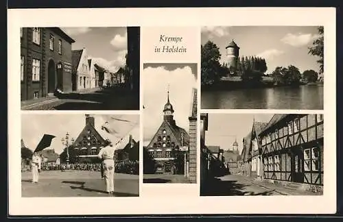 AK Krempe in Holstein, Ortsansicht mit Wasserturm, Rathaus und Fahnenapell