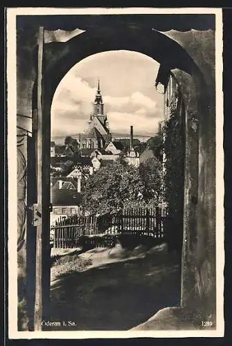 AK Öderan, Ortsansicht aus einem Torbogen