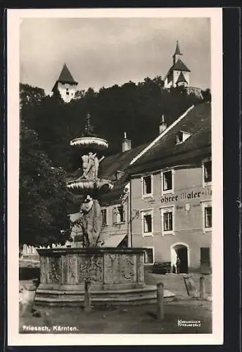 AK Friesach /Kärnten, Ortspartie mit Brunnen