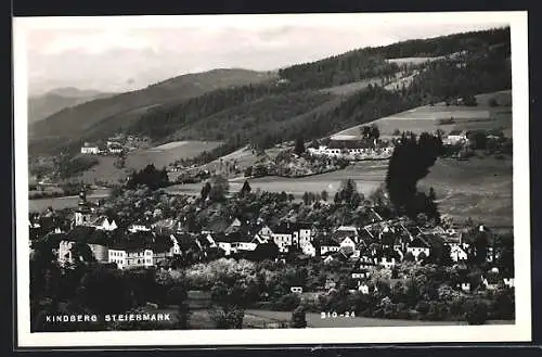 AK Kindberg, Steiermark, Teilansicht vor bewaldeten Bergen