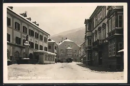 AK Steinach /Brenner, Verschneite Strassenpartie zum Hotel Steinbock führend