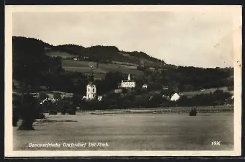 AK Grafendorf /Ost-Stmk., Teilansicht mit Feld und Kirche