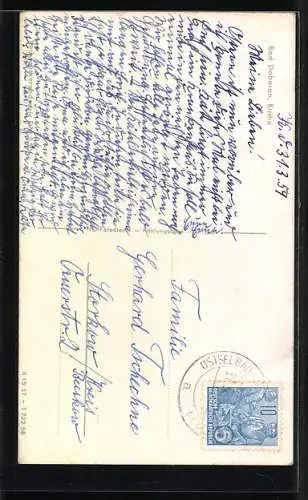 AK Bad Doberan, Strassenpartie mit Kirche