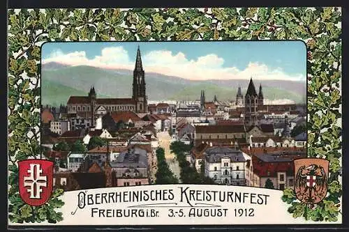 AK Freiburg i. Br., XI. Oberrheinisches Kreisturnfest 1912, Teilansicht mit Kirche und Strassenpartie, Wappen des DTB