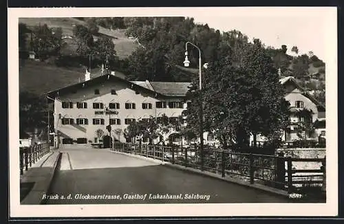 AK Bruck a. d. Grossglocknerstrasse, Gasthof Lukashansl mit Strassenpartie