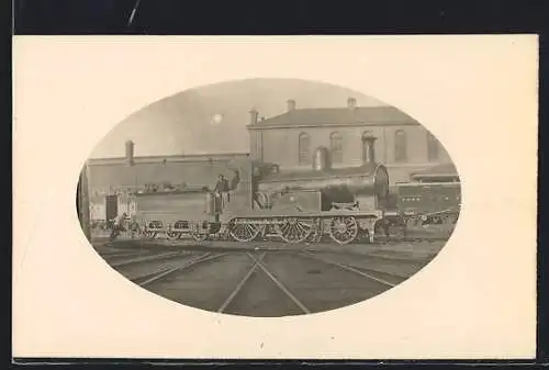 AK Locomotive St. Patrick (No. 8) with a cart of stones on a railway turntable
