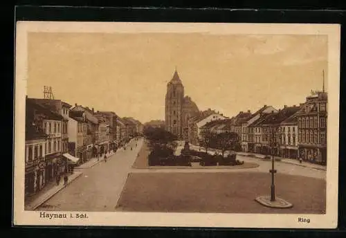 AK Haynau i. Schl., Strasse Ring mit Geschäften und Kirche