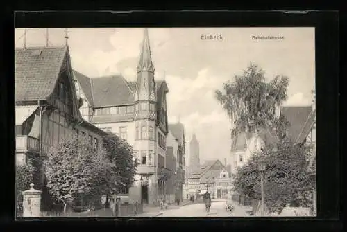 AK Einbeck, Bahnhofstrasse mit Radfahrer
