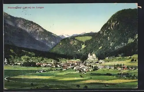AK Mauterndorf, Totalansicht mit Blick auf Kirche und Gebirge