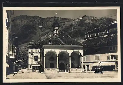 AK Brunnen, Strassenpartie mit Uhrengeschäft und Kirche