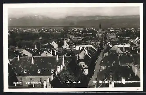 AK Wr.-Neustadt /Niederdonau, Teilansicht mit Strassenpartie gegen Schneeberg und Hohe Wand