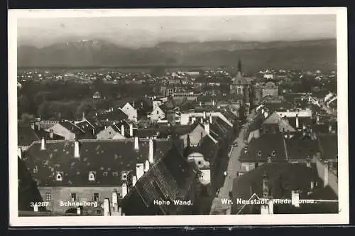AK Wr.-Neustadt /Niederdonau, Teilansicht mit Strassenpartie gegen Schneeberg und Hohe Wand