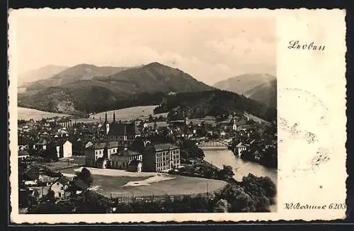 AK Leoben, Ortsansicht mit der Kirche am Fluss