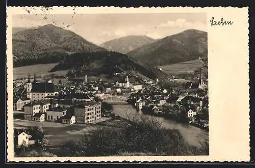 AK Leoben, Gesamtansicht am Fluss mit der Kirche