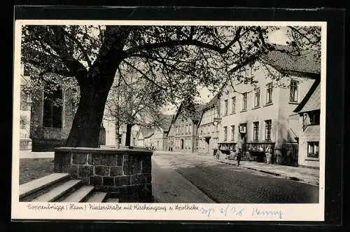 AK Coppenbrügge /Hann., Niederstrasse mit Kircheingang u. Apotheke