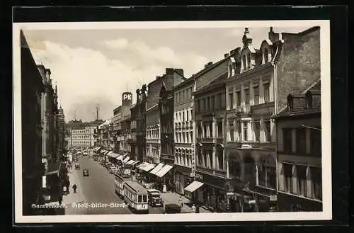 AK Saarbrücken, Blick in die Strasse mit Strassenbahn