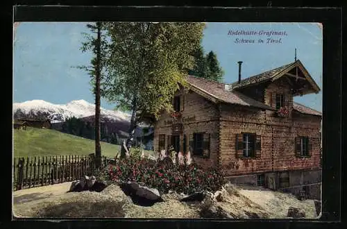 AK Schwaz in Tirol, Blumenbeet an der Rodelhütte Grafenast