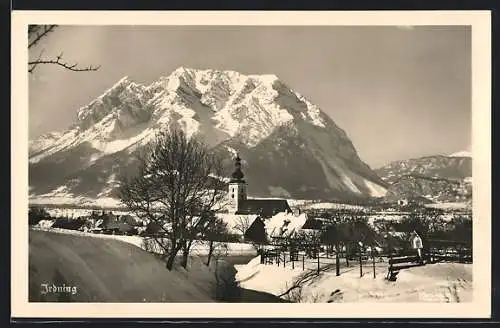 AK Irdning, Ortsansicht gegen die Berge im Winter