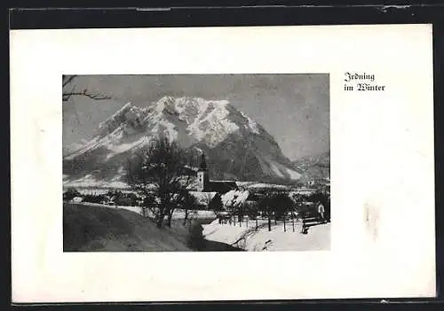 AK Irdning, Ortspartie mit Kirche im Winter