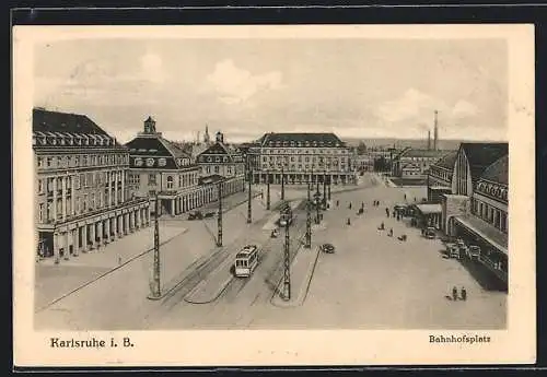 AK Karlsruhe i. B., Bahnhofsplatz aus der Vogelschau, Strassenbahn