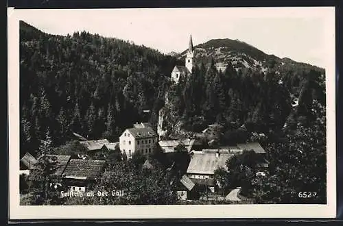 AK Feistritz an der Gail, Ortsansicht mit der Kirche auf dem Berg