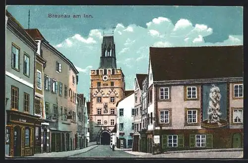 AK Braunau am Inn, Strassenpartie mit Kirche