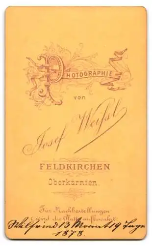 Fotografie Josef Weifsl, Feldkirchen in Oberkärnten, Niedliches Kleinkind im Hochstuhl