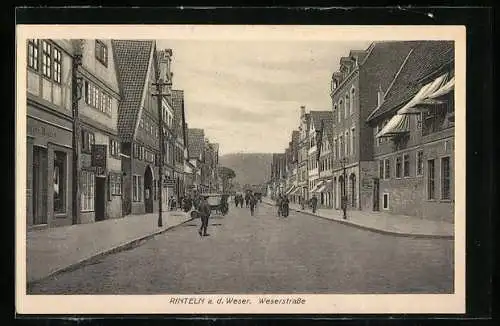 AK Rinteln a. d. Weser, Weserstrasse mit Geschäften