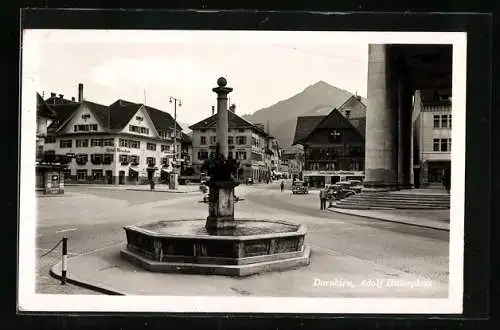 AK Dornbirn, der  Platz mit Brunnen, Hotel Hirschen, Drogerie, parkende Autos