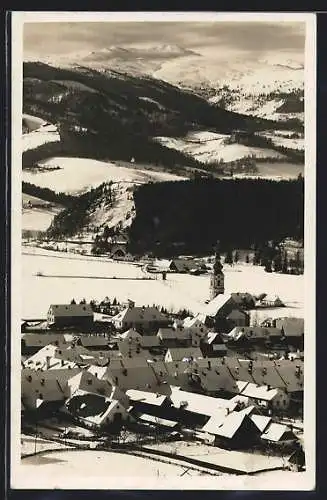 AK Obdach, Ortsansicht mit Bergen im Winter
