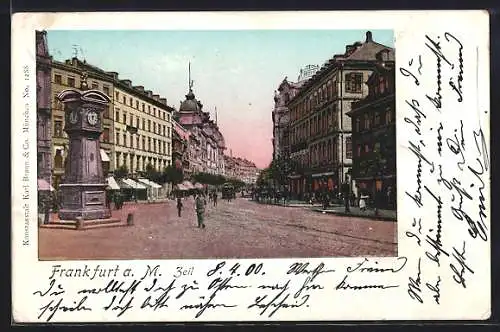Goldfenster-AK Frankfurt a. M, Strassenblick in die Zeil mit Uhr und mit leuchtenden Fenstern